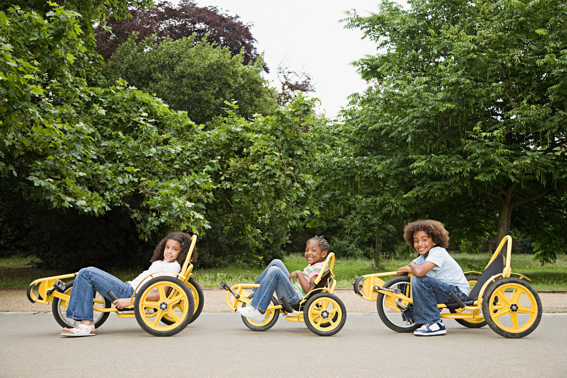 Children on tricycles